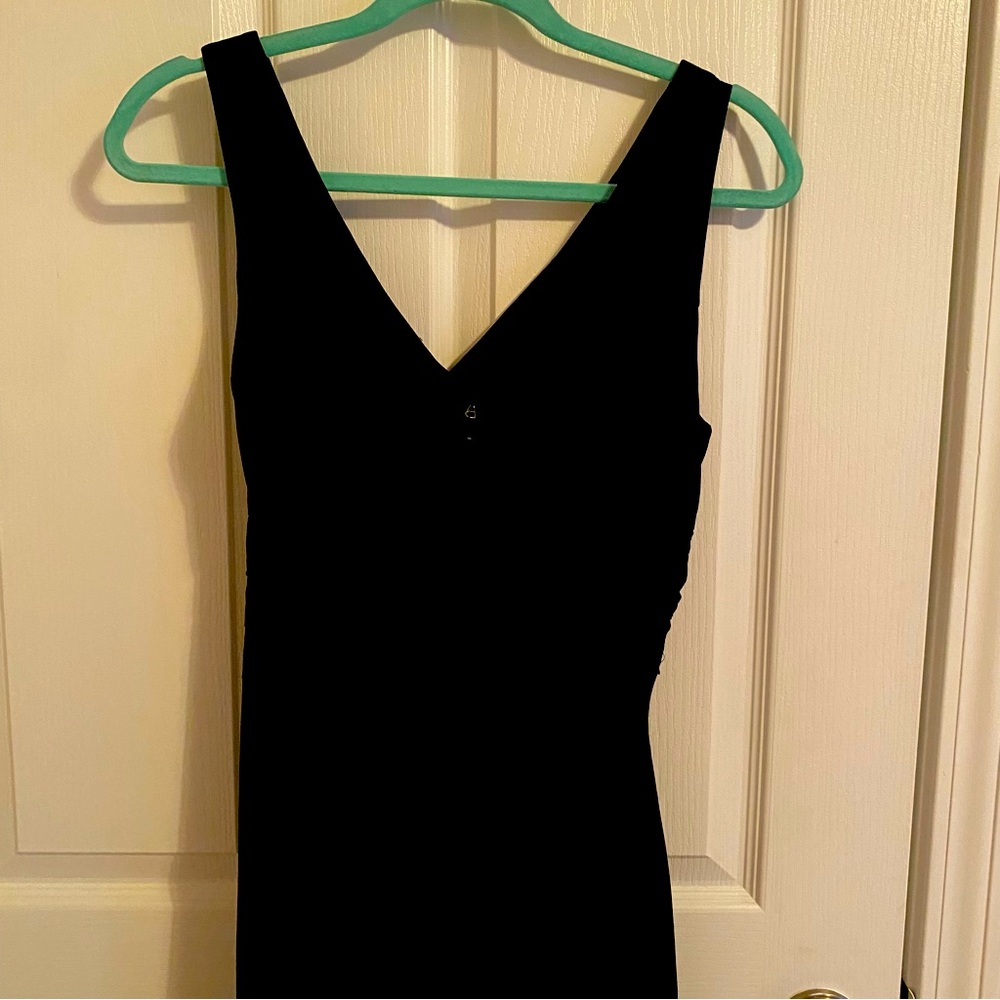 Ladies black gown, worn in a wedding.  Size 4, Simple, elegant and timeless.